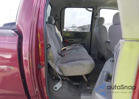 2003 Ford F-150 Lariat/Xlt z USA, uszkodzony, nr VIN 1FTRW07643KB31571